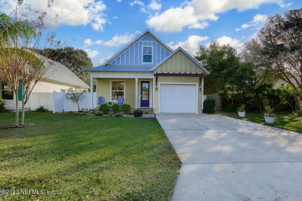 311 E Street St. Augustine, FL 32080 - Photo 2 of 40 a front view of house with yard and green space