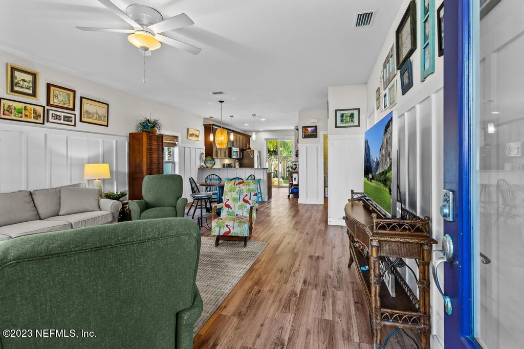 311 E Street St. Augustine, FL 32080 - Photo 5 of 40 a living room with furniture and a flat screen tv