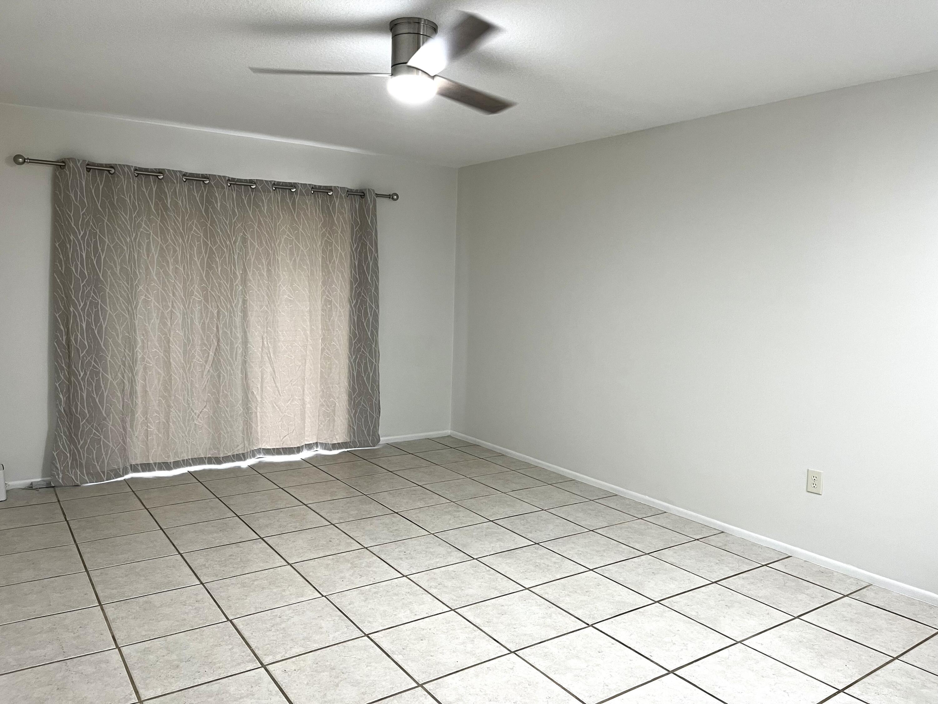 4773 Sisson Road Titusville, FL 32780 - Photo 8 of 24 Tiled Living Room