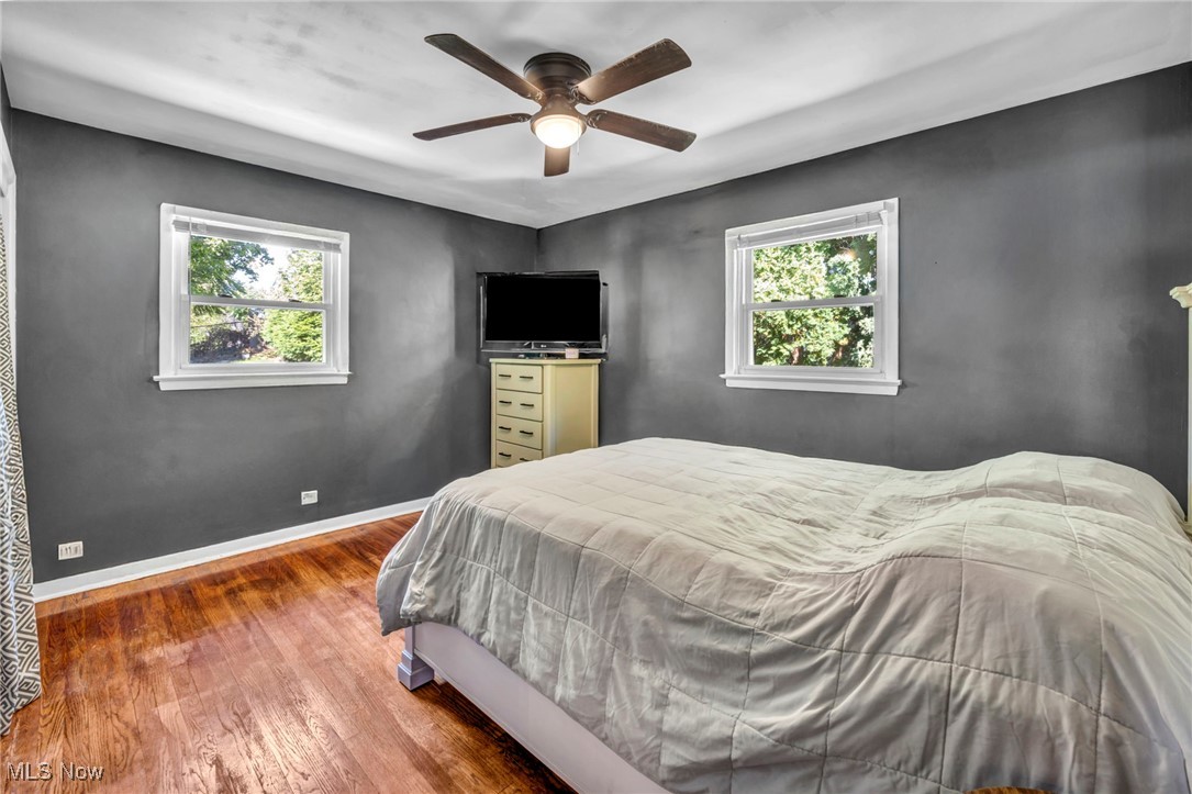 1641 Slusser Road Akron, OH 44305 - Photo 15 of 34 Bedroom featuring wood finished floors and a ceiling fan