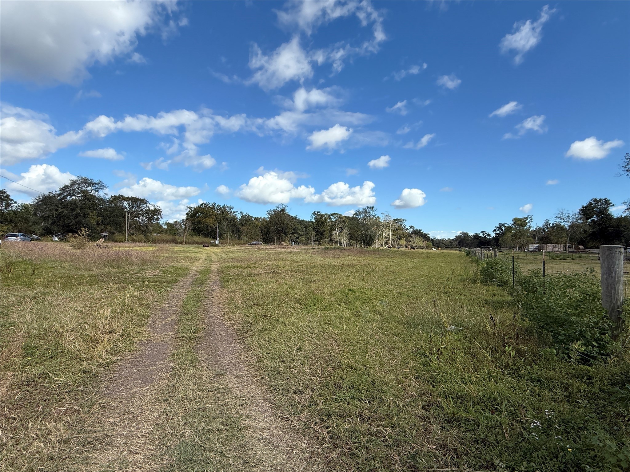 2442 Brazos River Road Freeport, TX 77541 - Photo 3 of 11 a view of a lake with houses in the back