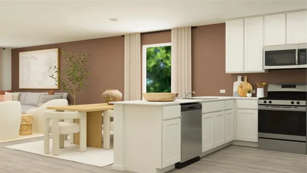 a kitchen with stainless steel appliances granite countertop a sink and cabinets with wooden floor