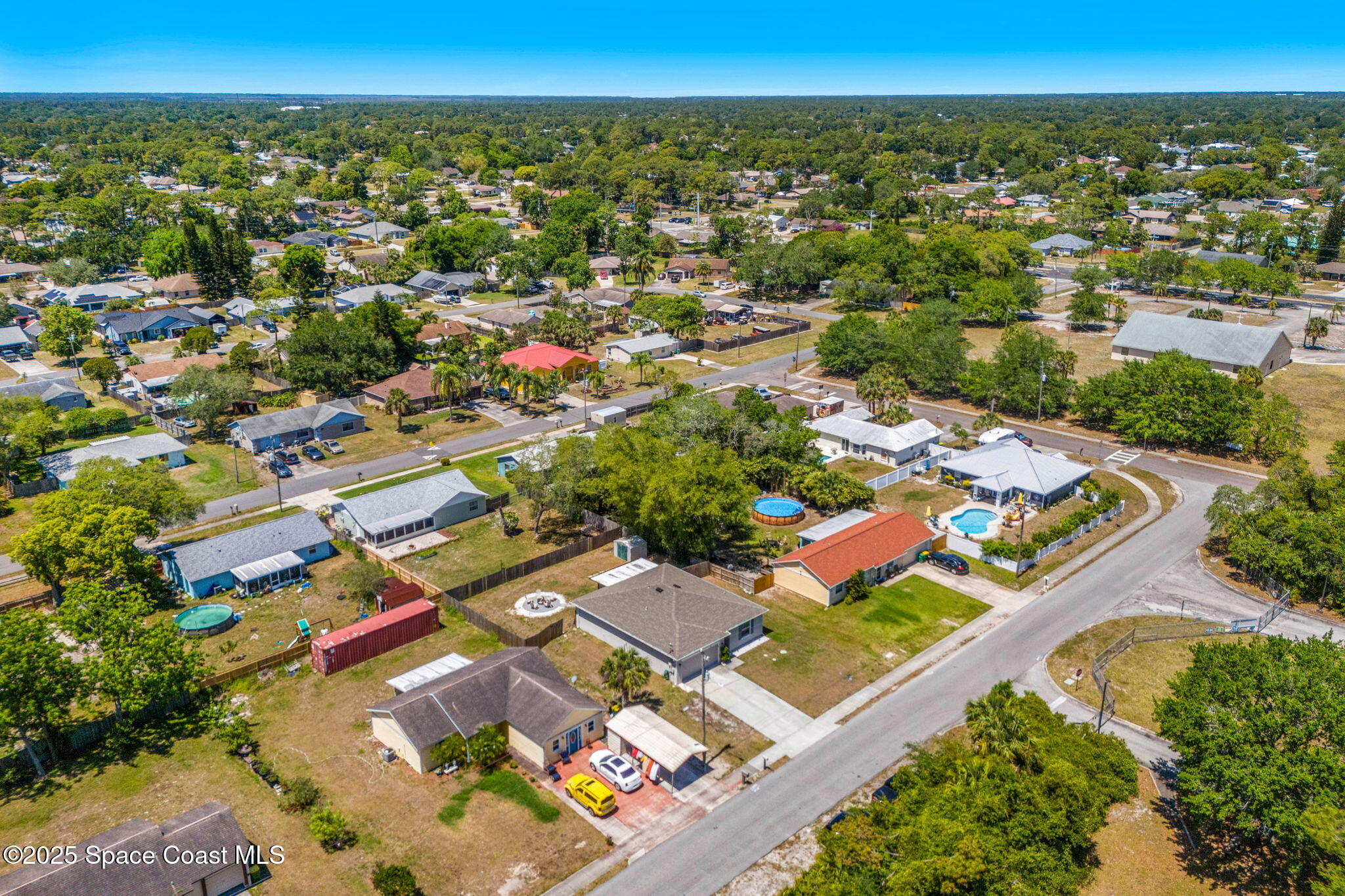 6162 Rena Avenue Cocoa, FL 32927 - Photo 40 of 42 an aerial view of residential houses with outdoor space