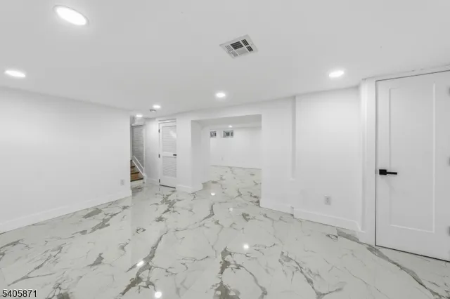 a bathroom with a shower and a toilet