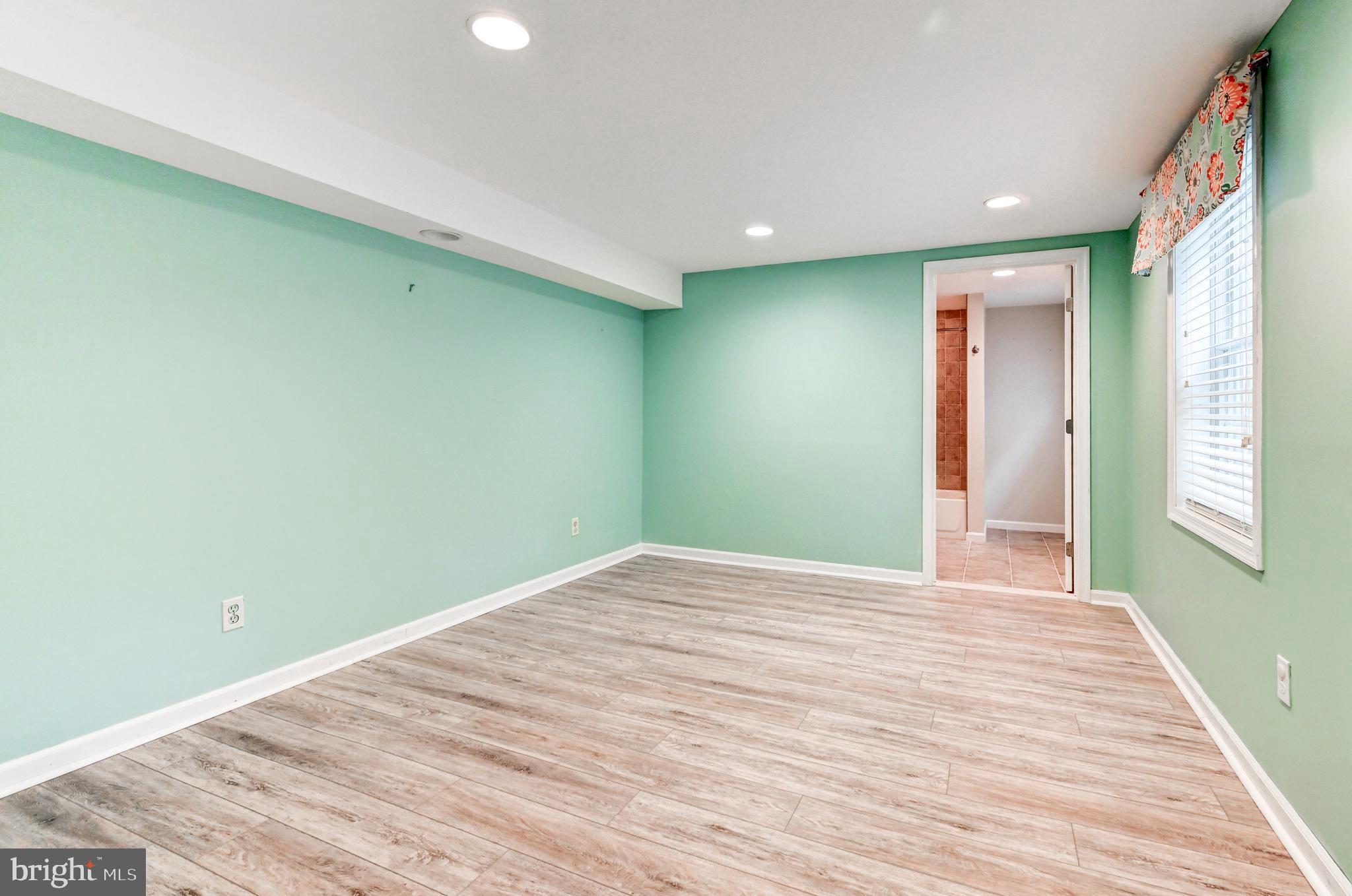7920 Springway Road Baltimore, MD 21204 - Photo 29 of 49 a view of empty room with wooden floor