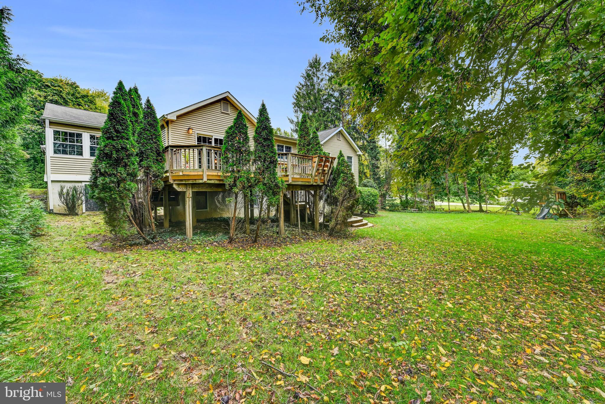 7920 Springway Road Baltimore, MD 21204 - Photo 38 of 49 a view of a house with a yard and sitting area