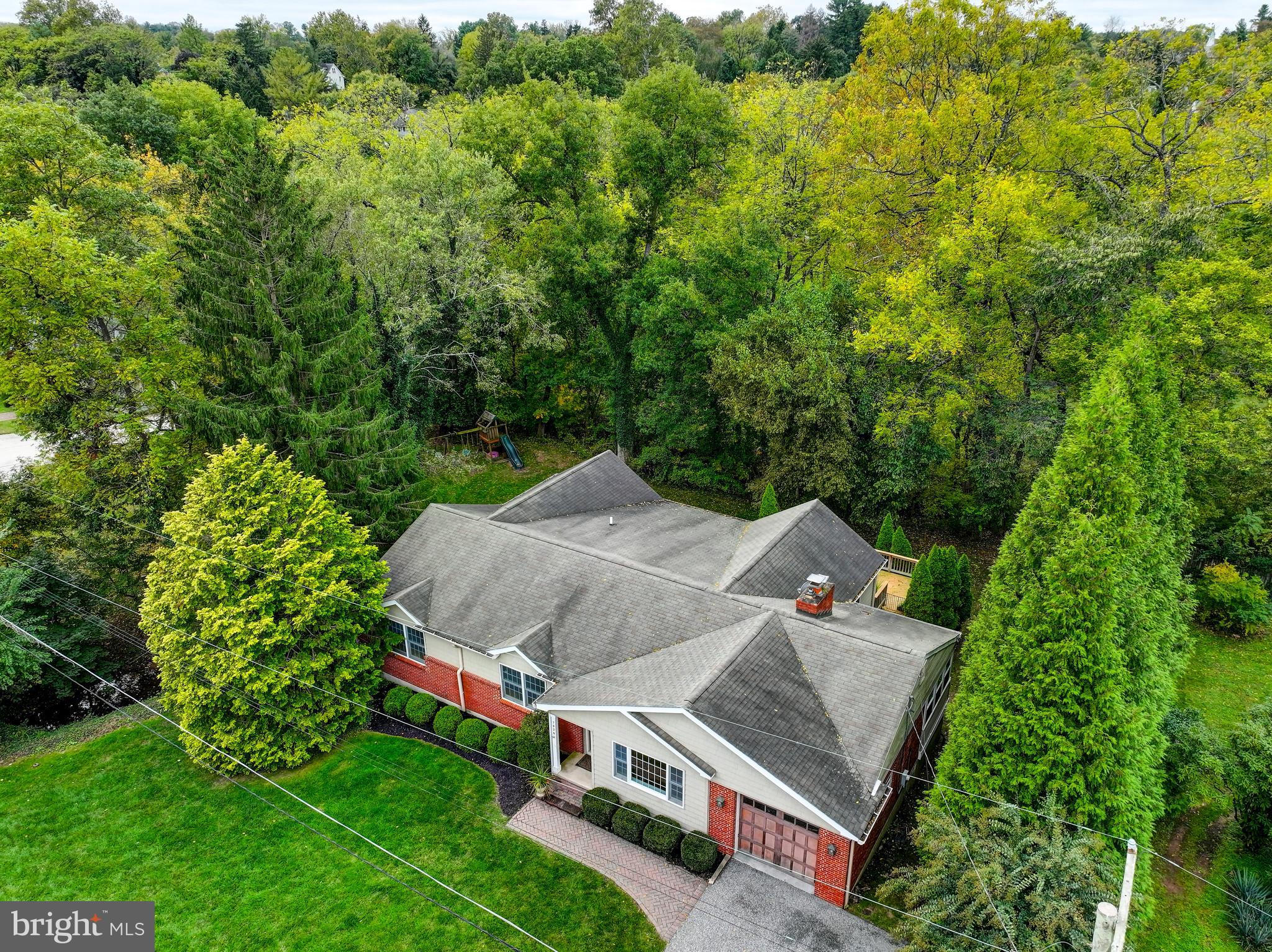 7920 Springway Road Baltimore, MD 21204 - Photo 44 of 49 an aerial view of a house with yard and outdoor seating