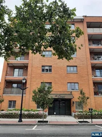 a view of a building with a street