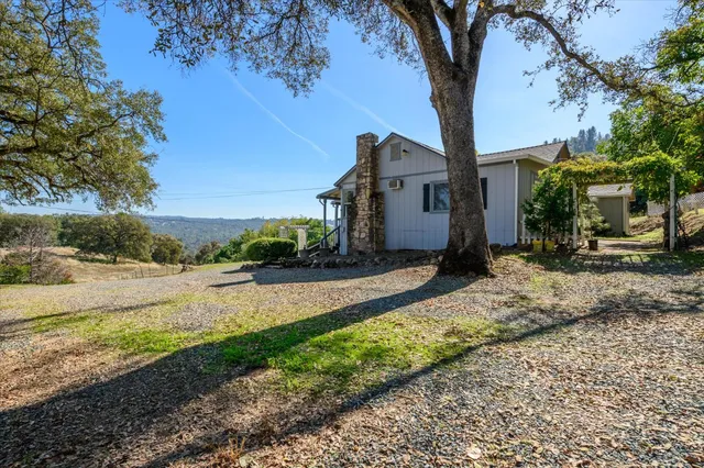 a view of a street with a building in the background