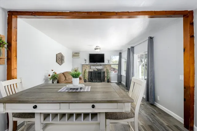 a kitchen with a table and chairs in it