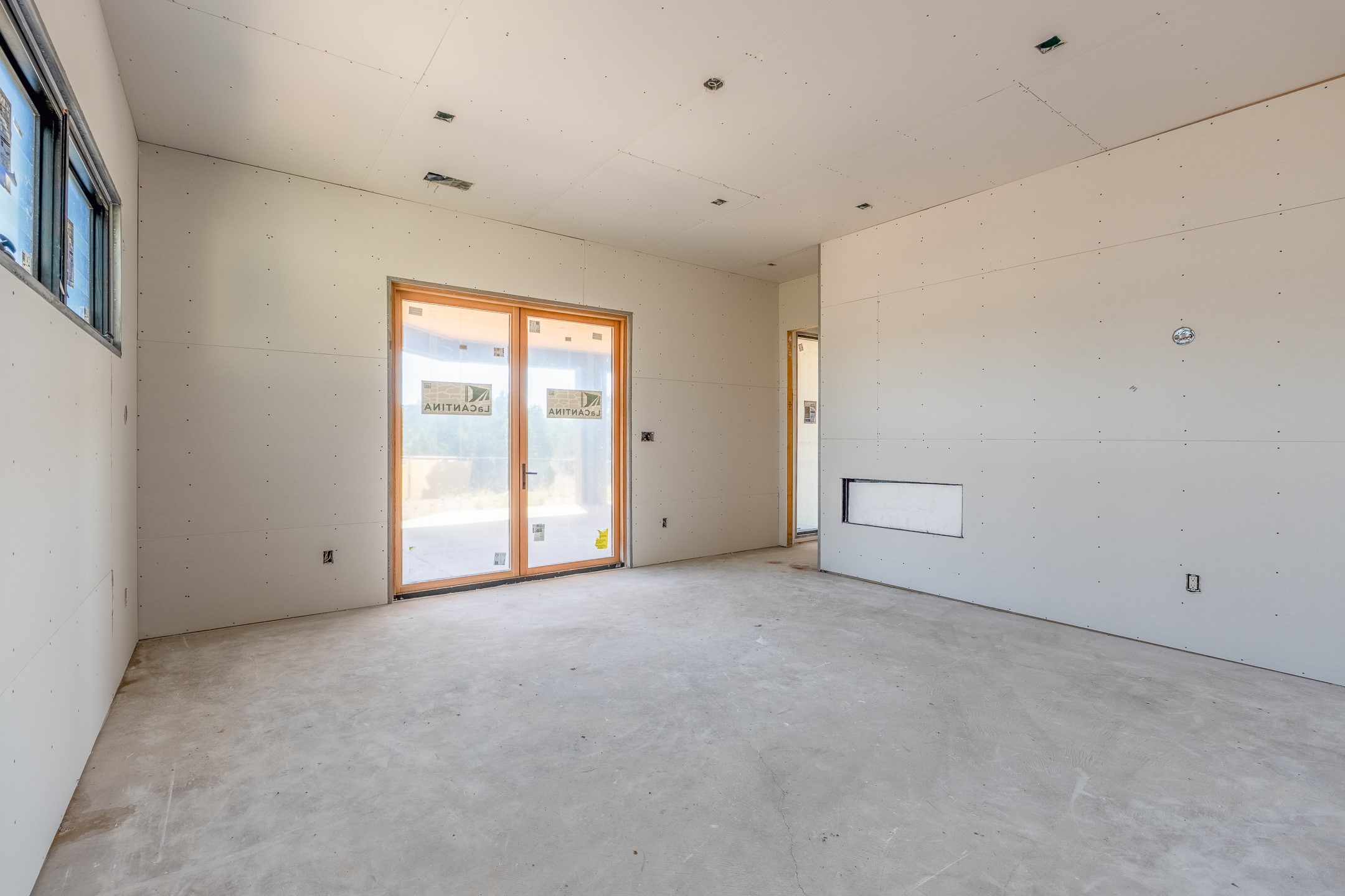 26 Sierra Rosa Loop Santa Fe, NM 87506 - Photo 19 of 25 Primary bedroom with fireplace