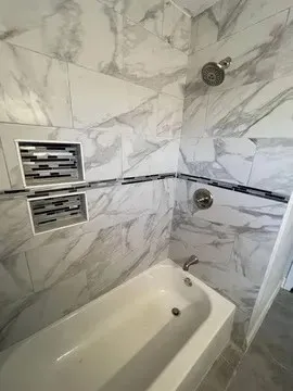a bathroom with a bathtub
