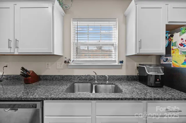 a bathroom with a toilet and a mirror