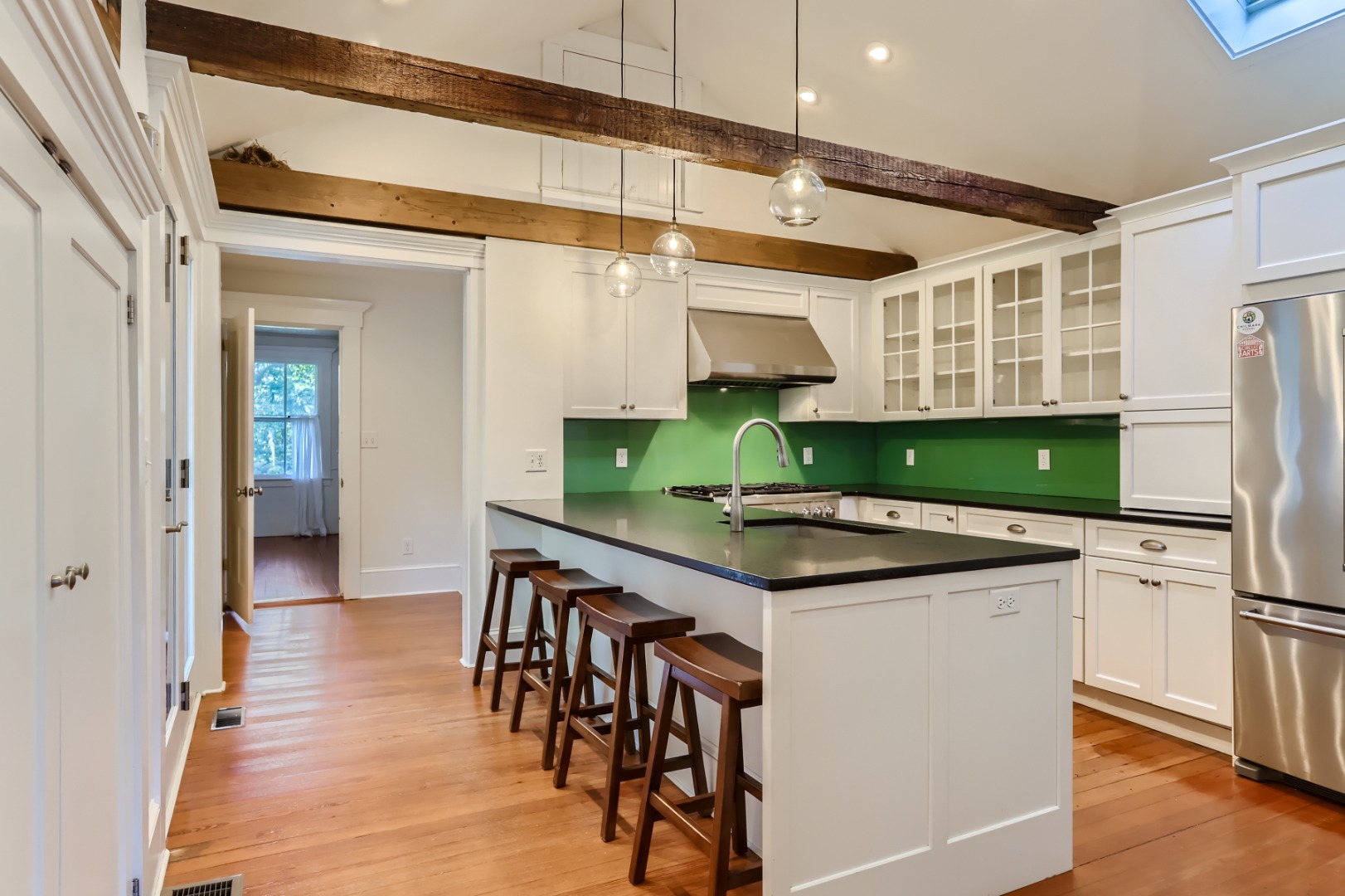 16 S Road Chilmark, MA 02535 - Photo 13 of 50 a kitchen with stainless steel appliances granite countertop a sink and a refrigerator