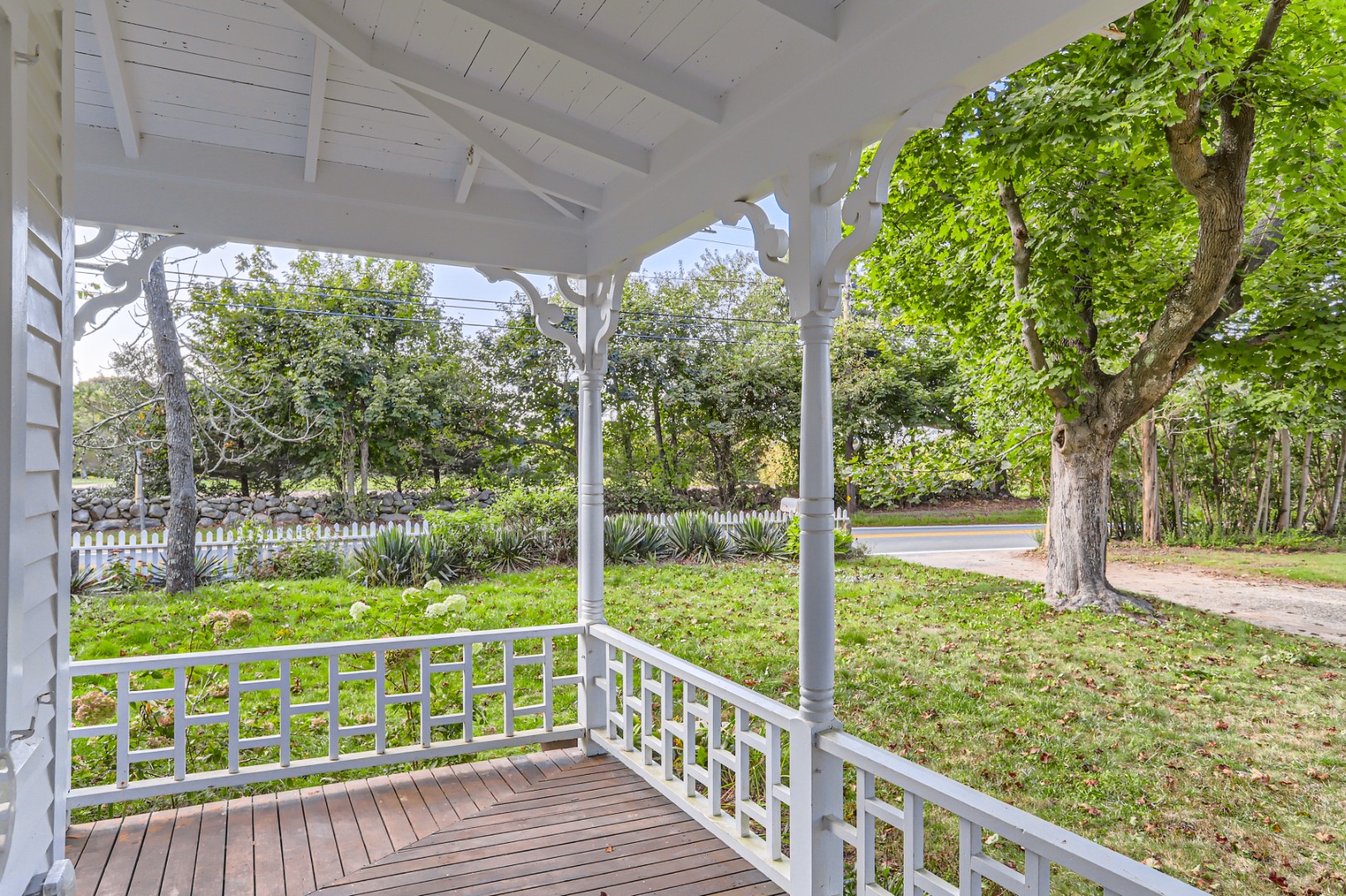 16 S Road Chilmark, MA 02535 - Photo 48 of 50 a view of a porch with a yard