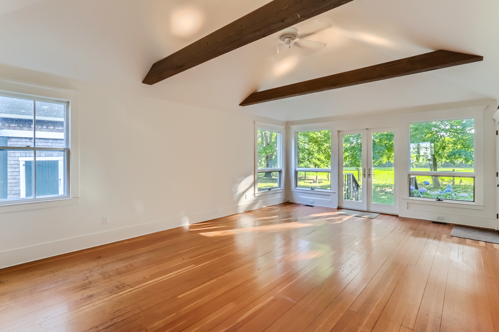 16 S Road Chilmark, MA 02535 - Photo 9 of 50 a view of room with window and wooden floor