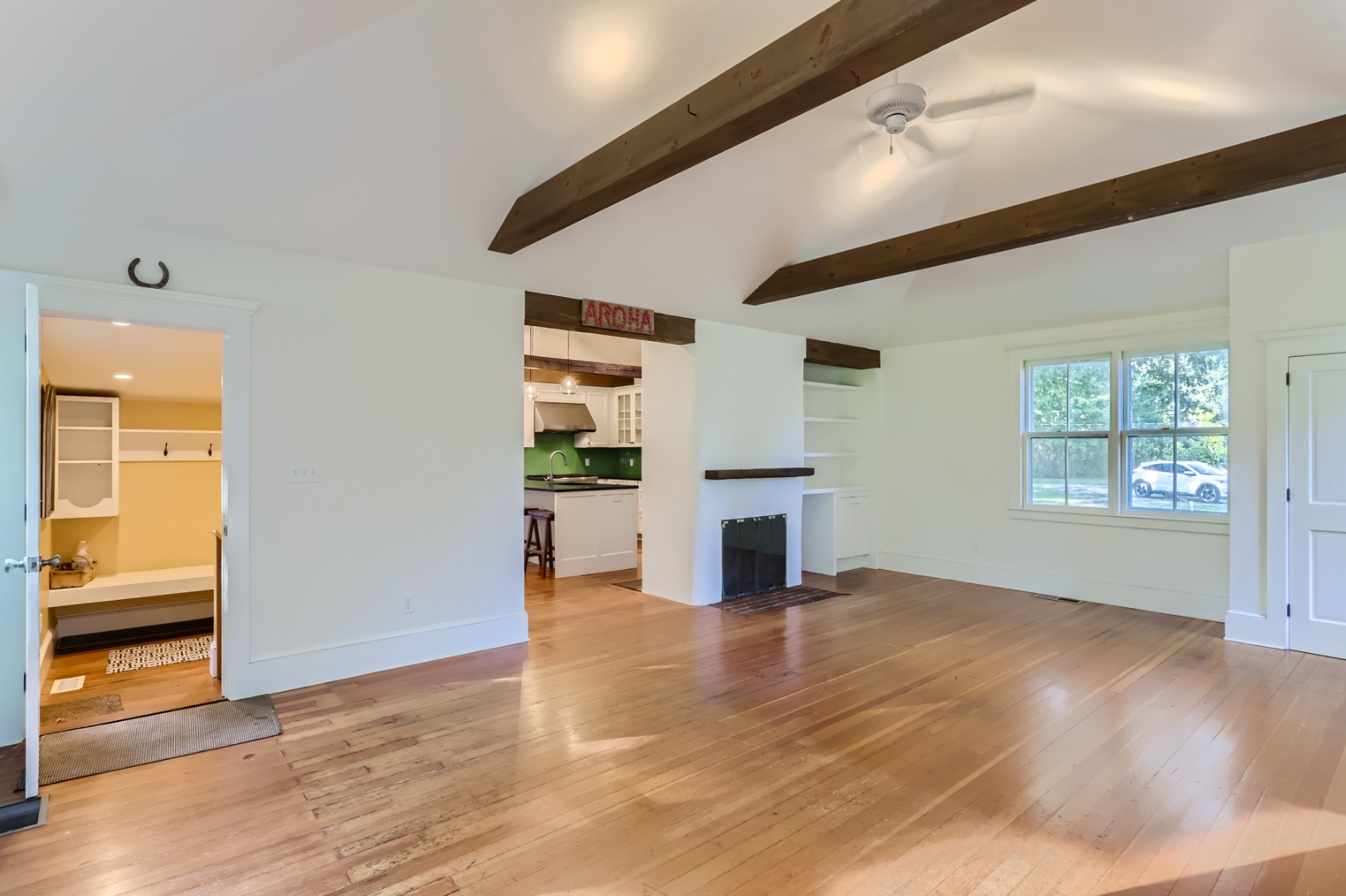16 S Road Chilmark, MA 02535 - Photo 10 of 50 a view of empty room with wooden floor and windows