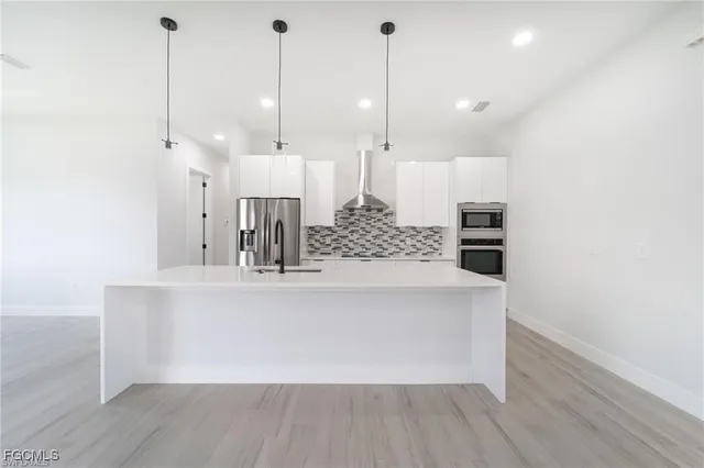 a view of living room with wooden floor