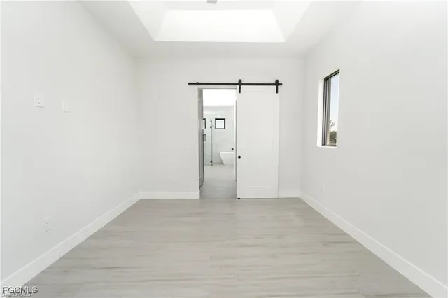 a bathroom with a double vanity sink toilet and shower