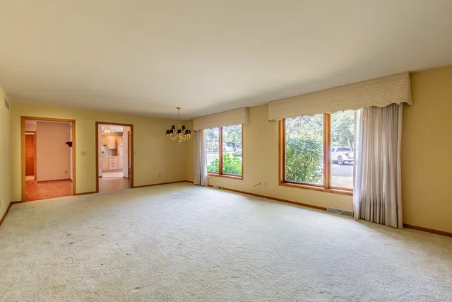 a view of a hallway with a outdoor space