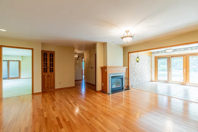 a kitchen with a stove a refrigerator and a sink