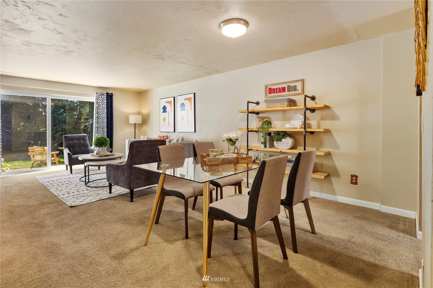 21527 4th Avenue West, Unit C44 Bothell, WA 98021 - Photo 12 of 40 a view of a dining room with furniture window and outside view