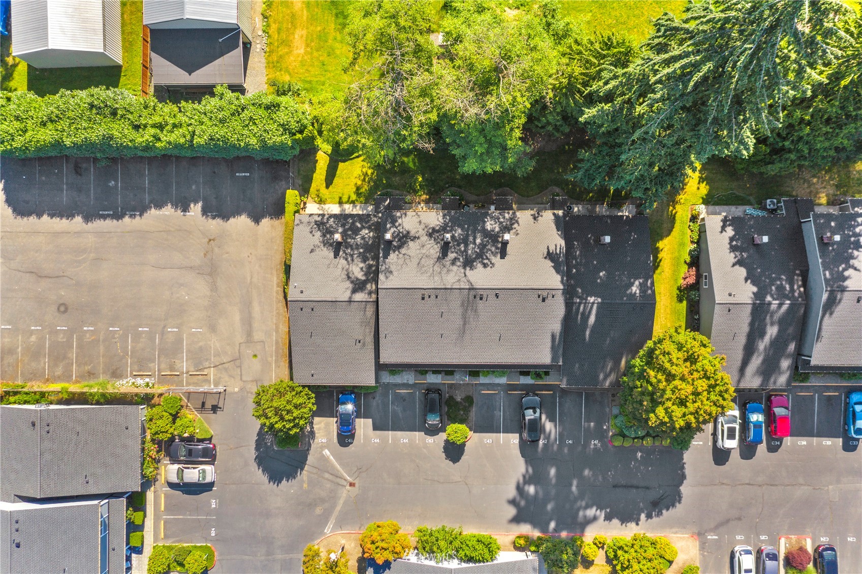 21527 4th Avenue West, Unit C44 Bothell, WA 98021 - Photo 35 of 40 an aerial view of a house with swimming pool and garden