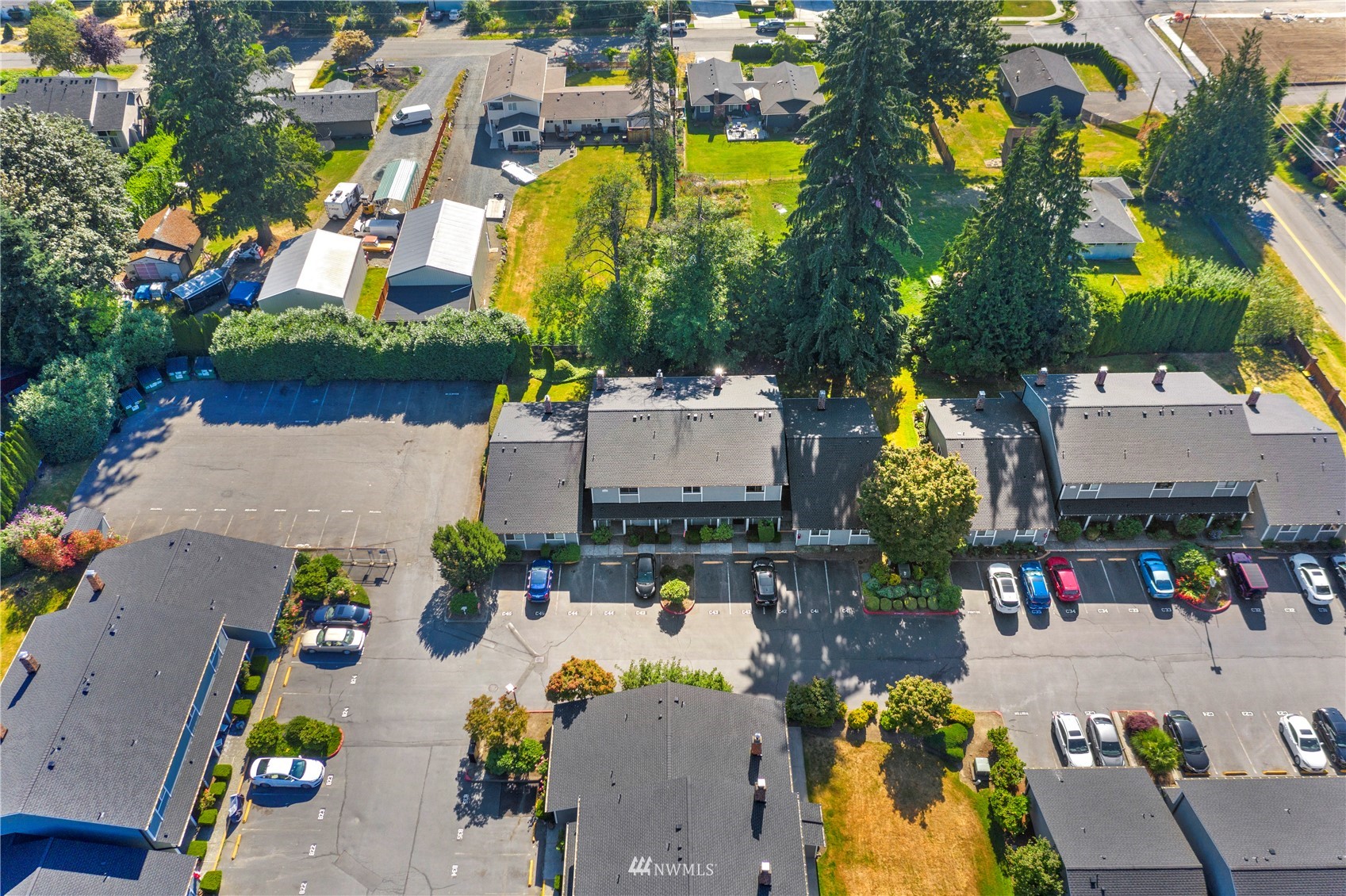 21527 4th Avenue West, Unit C44 Bothell, WA 98021 - Photo 36 of 40 an aerial view of a house with a swimming pool