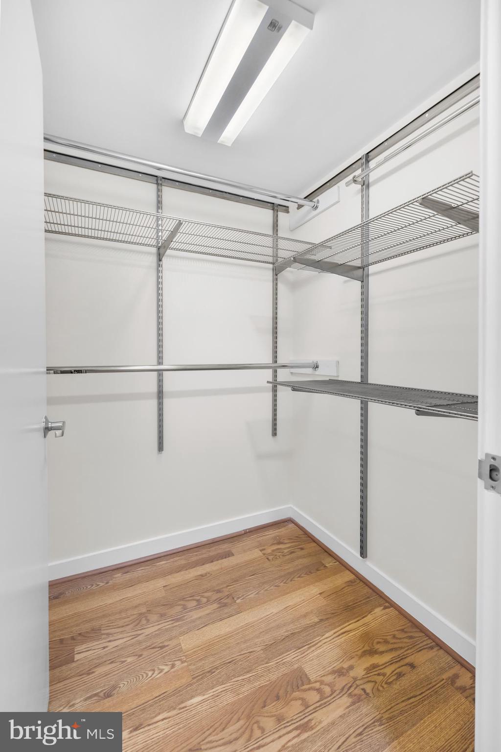 1275 25th Street Northwest, Unit 701 Washington, DC 20037 - Photo 18 of 36 a view of a room with racks on the wall