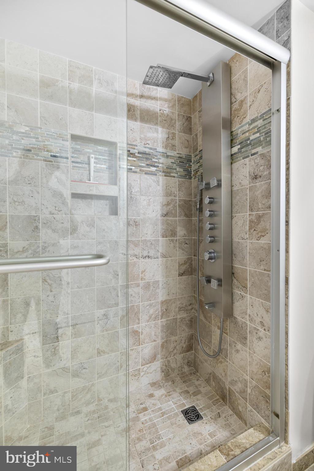 1275 25th Street Northwest, Unit 701 Washington, DC 20037 - Photo 20 of 36 a bathroom with a shower