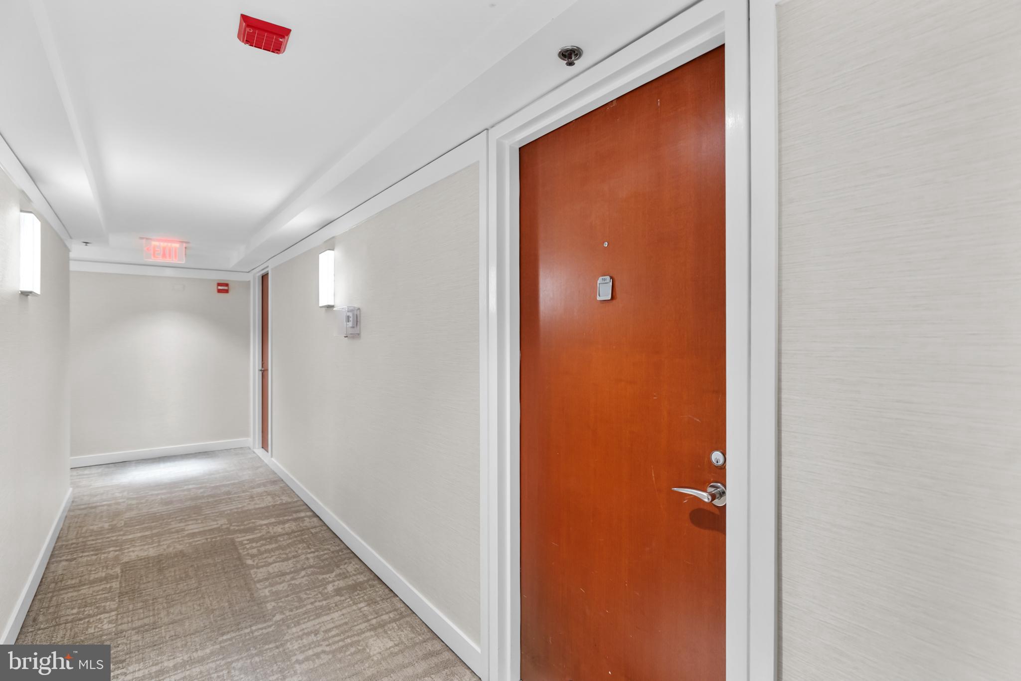 1275 25th Street Northwest, Unit 701 Washington, DC 20037 - Photo 29 of 36 a view of a hallway with closet