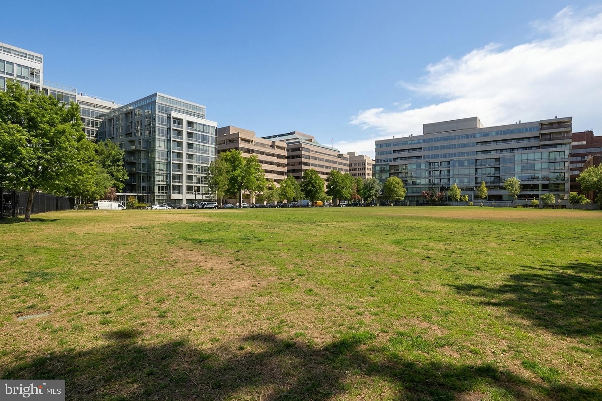 1275 25th Street Northwest, Unit 701 Washington, DC 20037 - Photo 34 of 36 a view of a building with yard and ocean view
