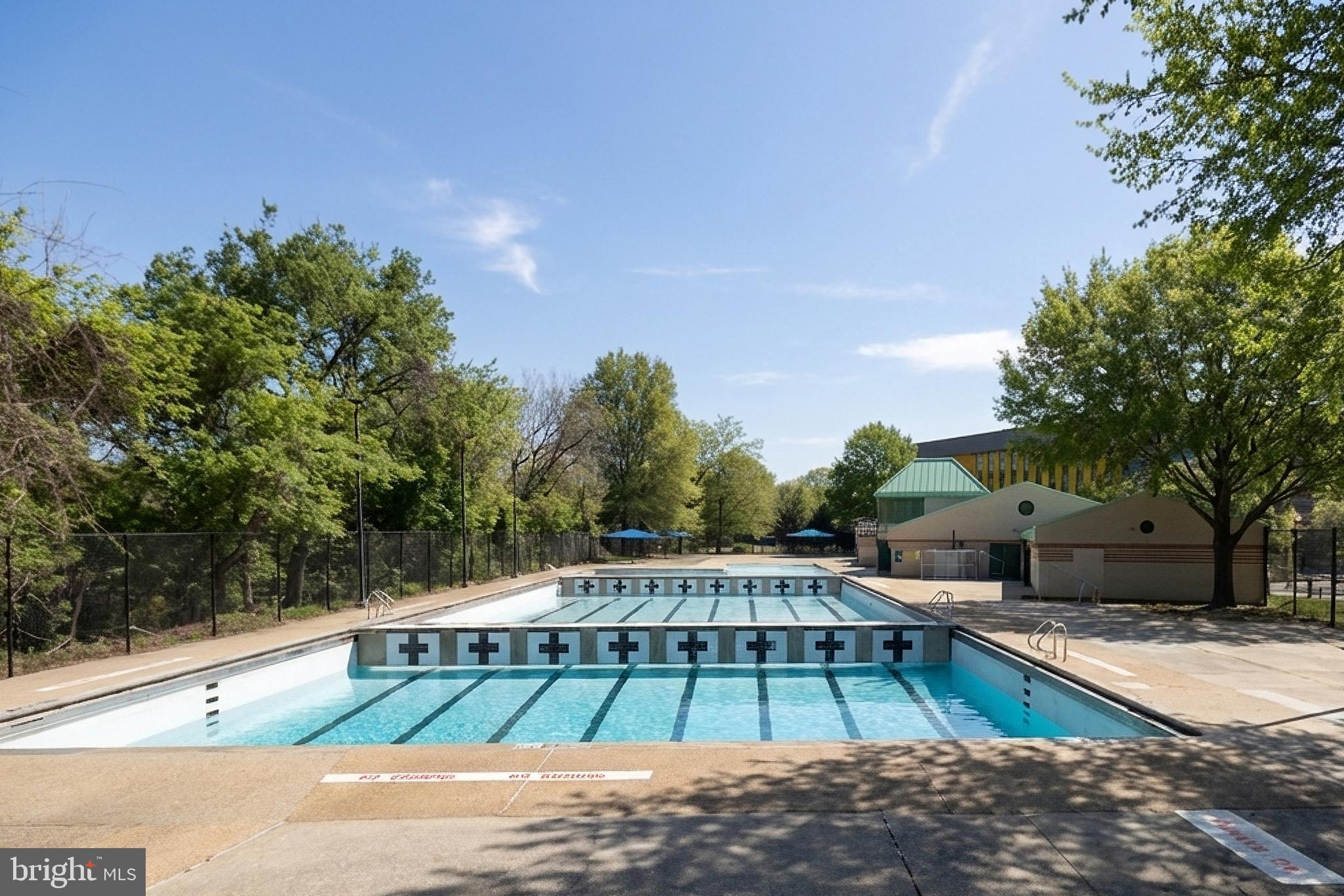 1275 25th Street Northwest, Unit 701 Washington, DC 20037 - Photo 36 of 36 a view of a swimming pool with an outdoor space and seating area