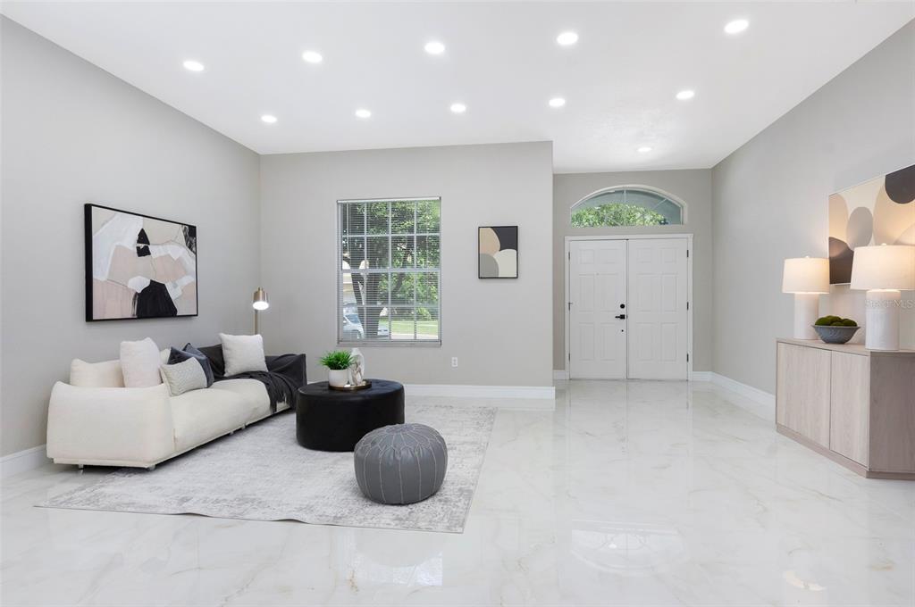2306 Colusa Lane Valrico, FL 33596 - Photo 11 of 50 a living room with furniture and a large window