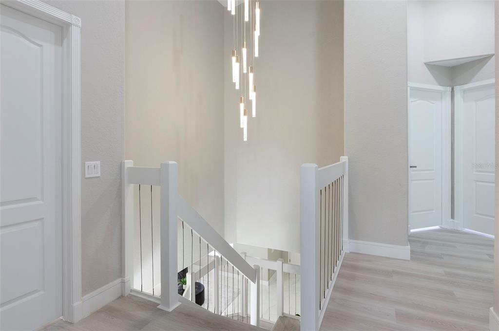 2306 Colusa Lane Valrico, FL 33596 - Photo 25 of 50 a view of a hallway with wooden floor and entryway
