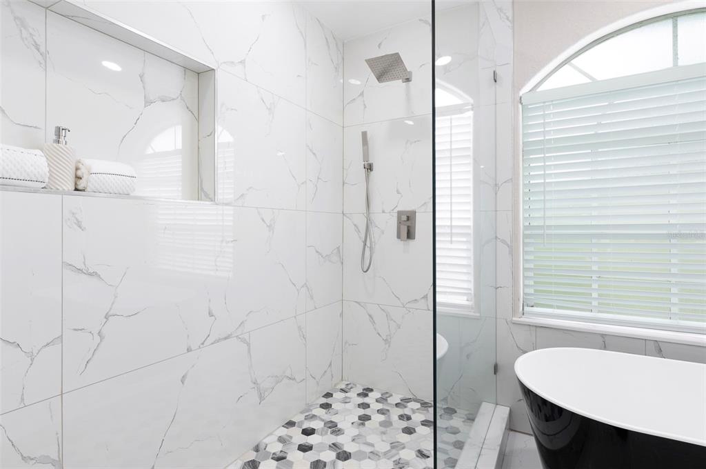 2306 Colusa Lane Valrico, FL 33596 - Photo 31 of 50 a bathroom with a sink and a mirror