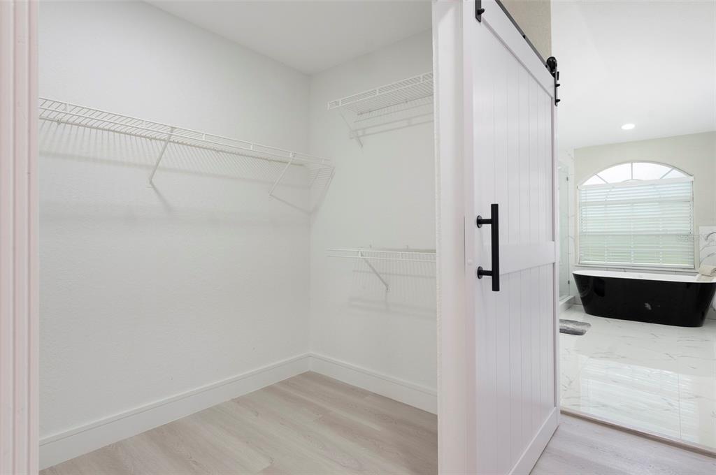 2306 Colusa Lane Valrico, FL 33596 - Photo 36 of 50 a view of a closet in a room