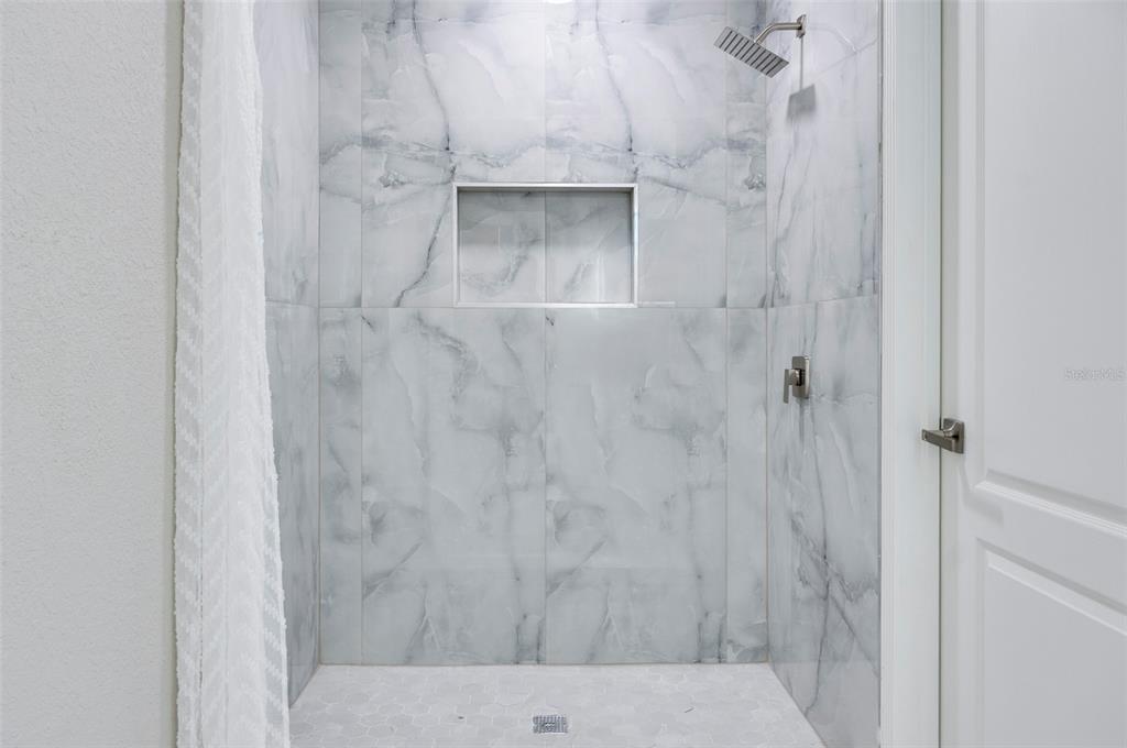 2306 Colusa Lane Valrico, FL 33596 - Photo 38 of 50 a bathroom with a shower