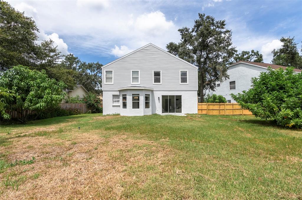 2306 Colusa Lane Valrico, FL 33596 - Photo 47 of 50 a view of house with garden and yard