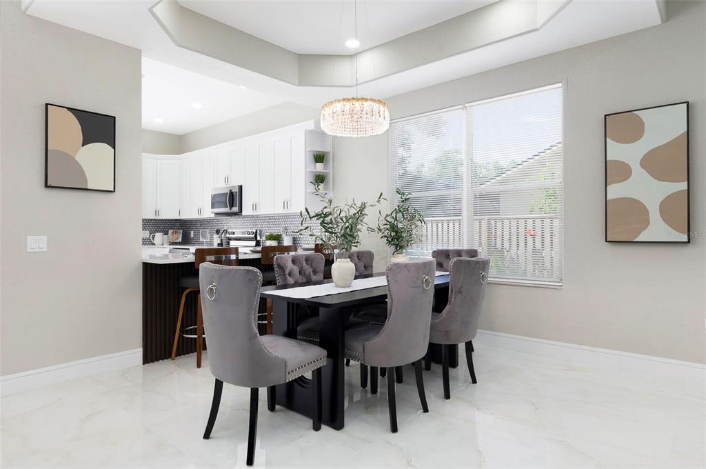 2306 Colusa Lane Valrico, FL 33596 - Photo 9 of 50 a dining room with furniture and window