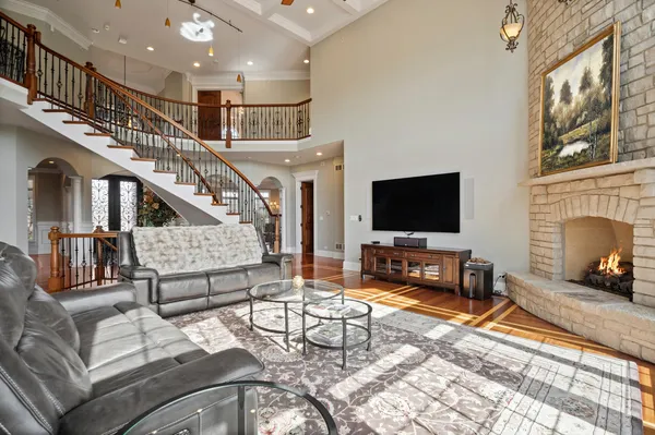 a kitchen with stainless steel appliances granite countertop a stove and cabinets