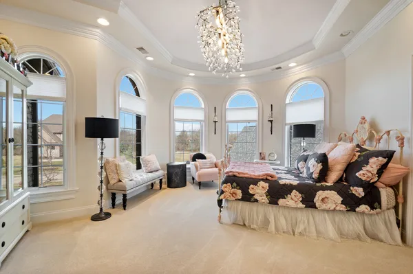 a building outdoor space with patio furniture and potted plants