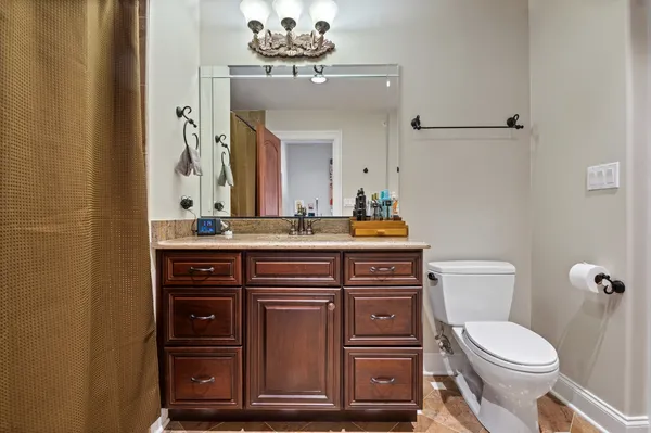 an aerial view of a house with yard swimming pool and outdoor seating