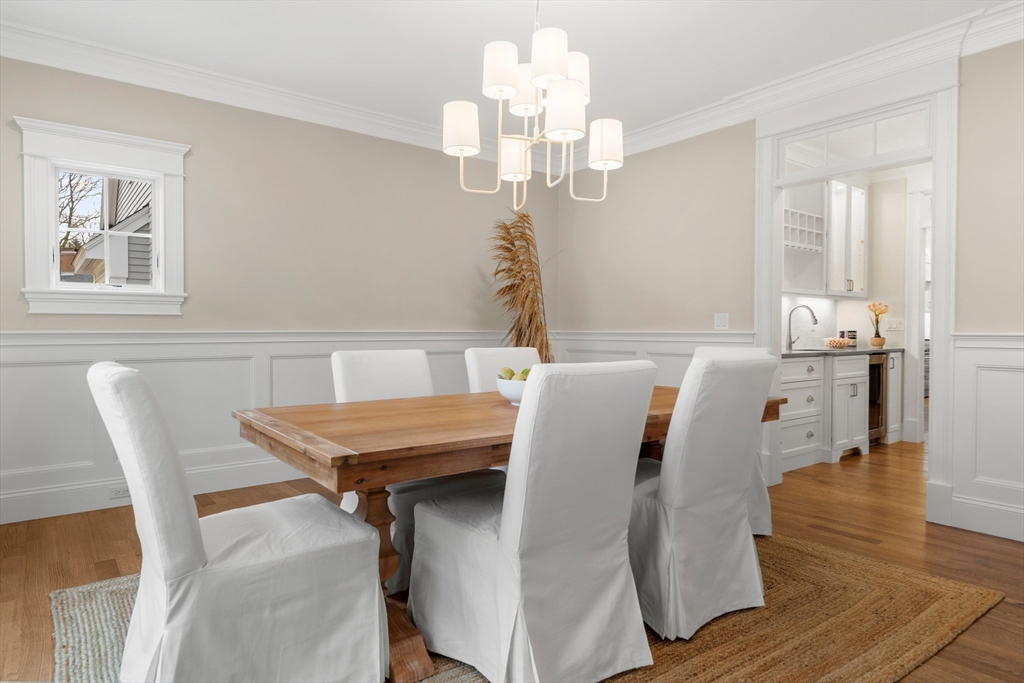 76 Martin Road Concord, MA 01742 - Photo 6 of 16 a view of a dining room with furniture and wooden floor