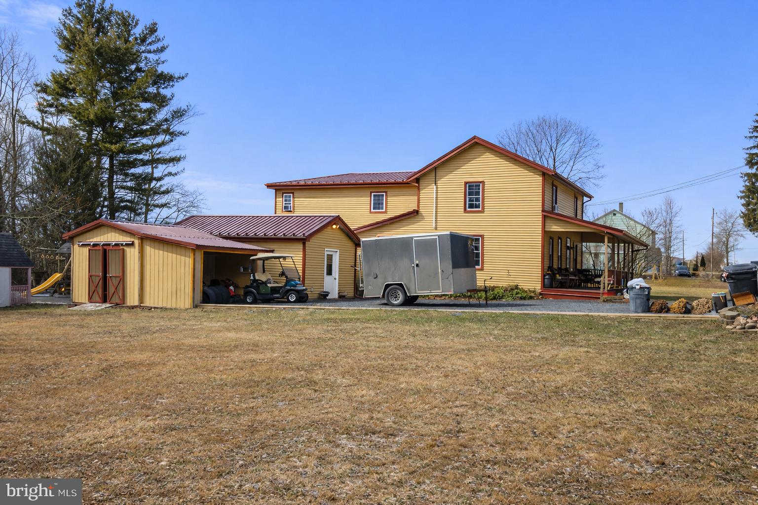 228 Rockey Road Loganton, PA 17747 - Photo 3 of 39 a front view of a house with a yard