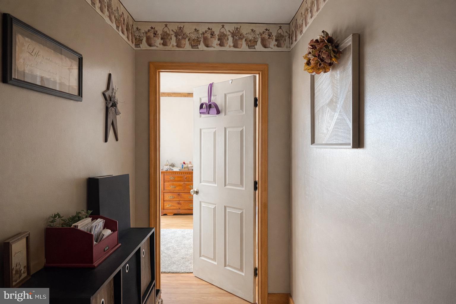 228 Rockey Road Loganton, PA 17747 - Photo 33 of 39 a hallway with kids room bathroom and a window