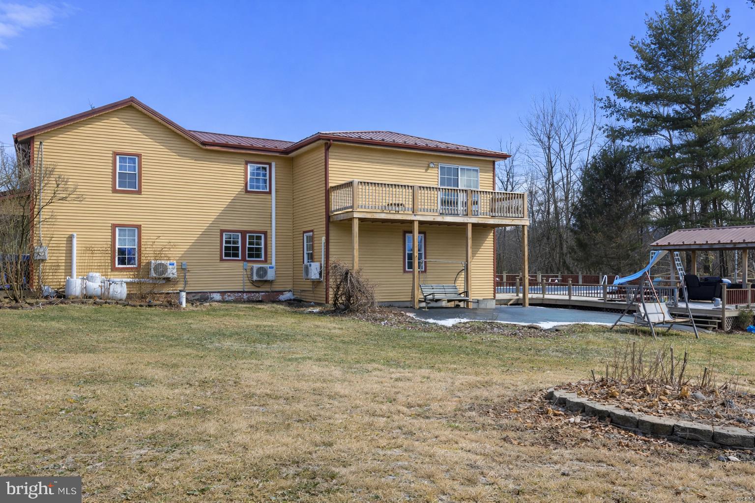 228 Rockey Road Loganton, PA 17747 - Photo 4 of 39 a view of a house with pool and sitting area
