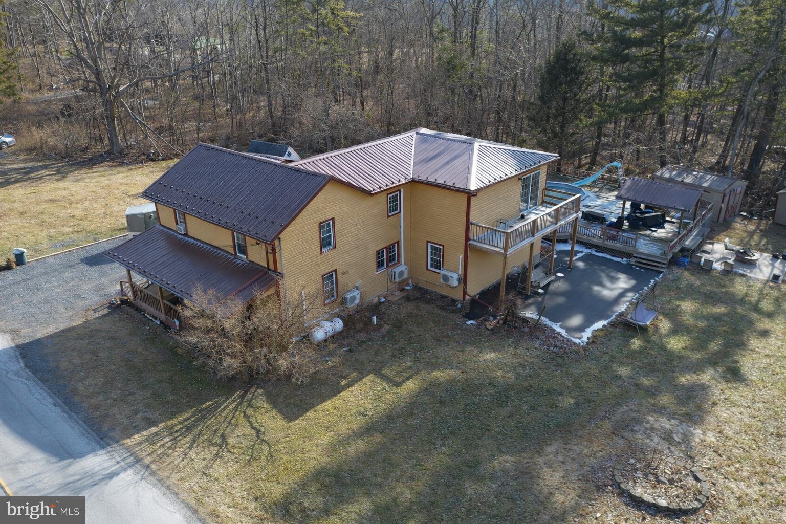 228 Rockey Road Loganton, PA 17747 - Photo 7 of 39 a view of a house with a yard
