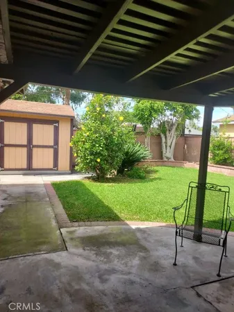 a view of backyard with green space