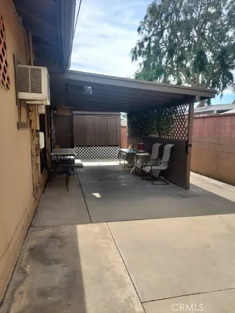 a view of outdoor space with porch and furniture